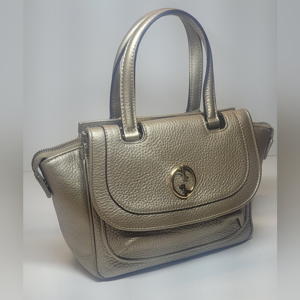 Sold ❌Gucci 1973 Metallic Leather Top Handle Bag